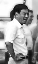 A person in a white shirt

Description automatically generated